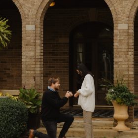 the-felt-estate-holland-mi-engagement-photo.jpg Couple getting engaged outside the historic Felt Estate in Holland, MI